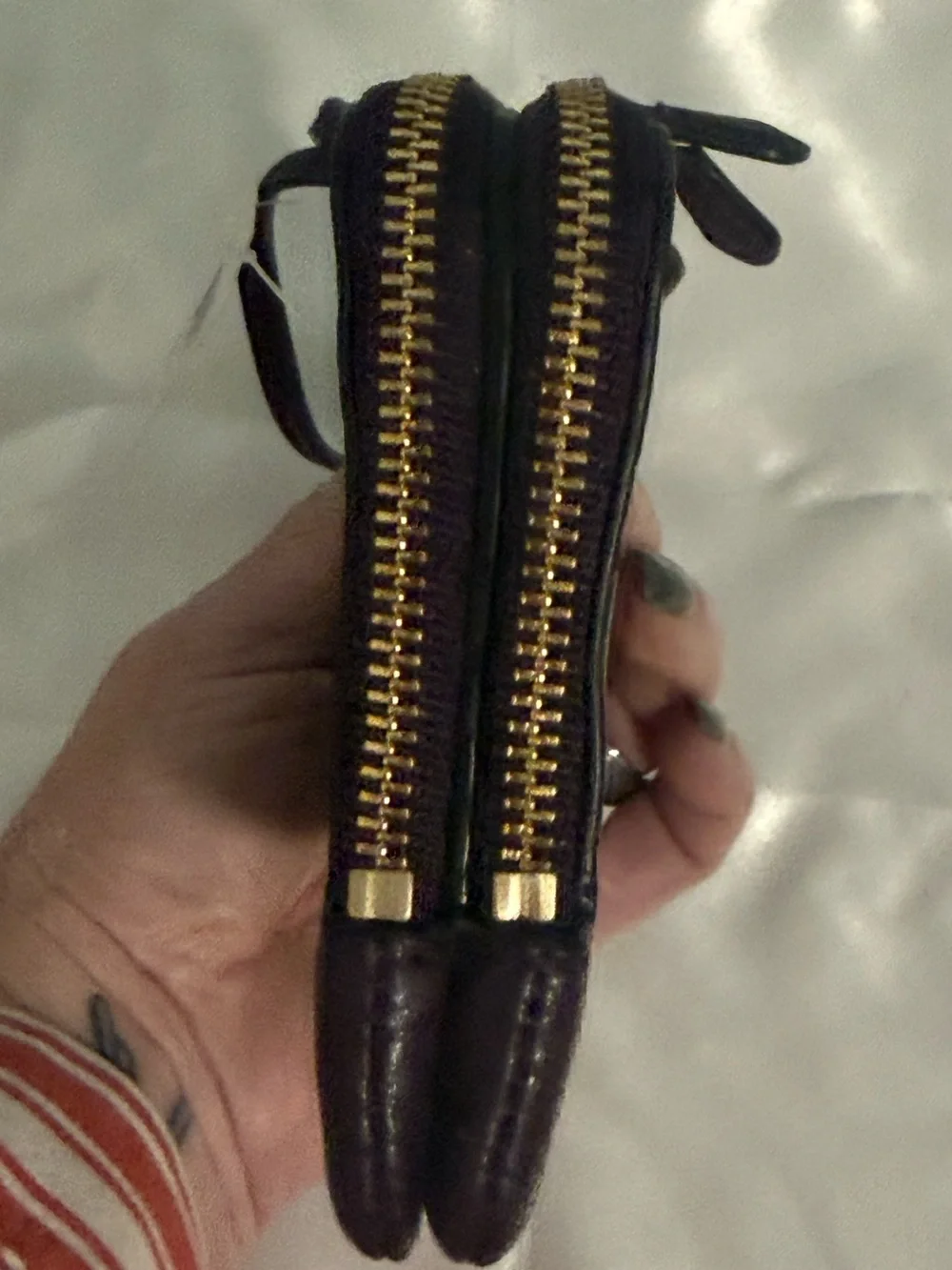Coach NWT Pebbled Leather Wristlet in Plum w/handtag and two zip compartments.